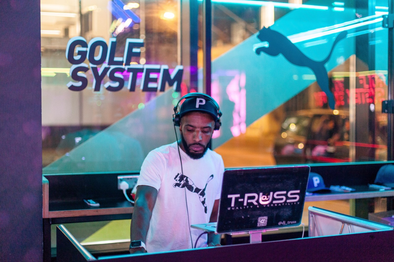DJ T-Russ performing at a Puma Golf event
