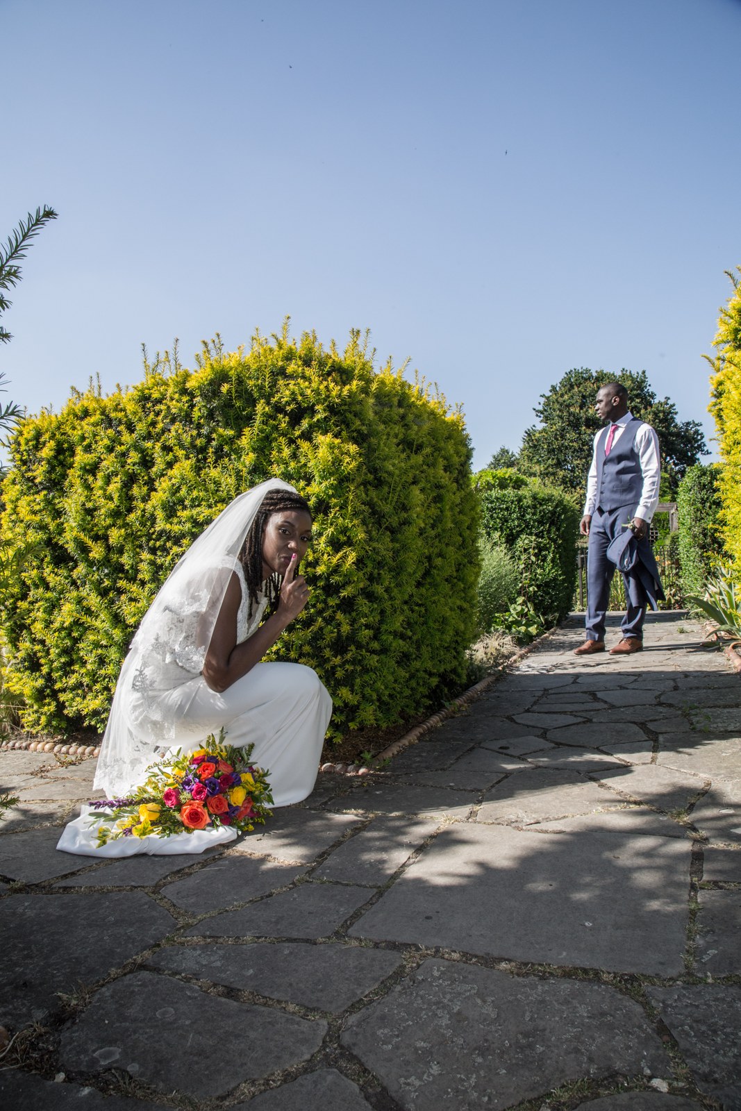 A bride and groom during an outdoor wedding ceremony